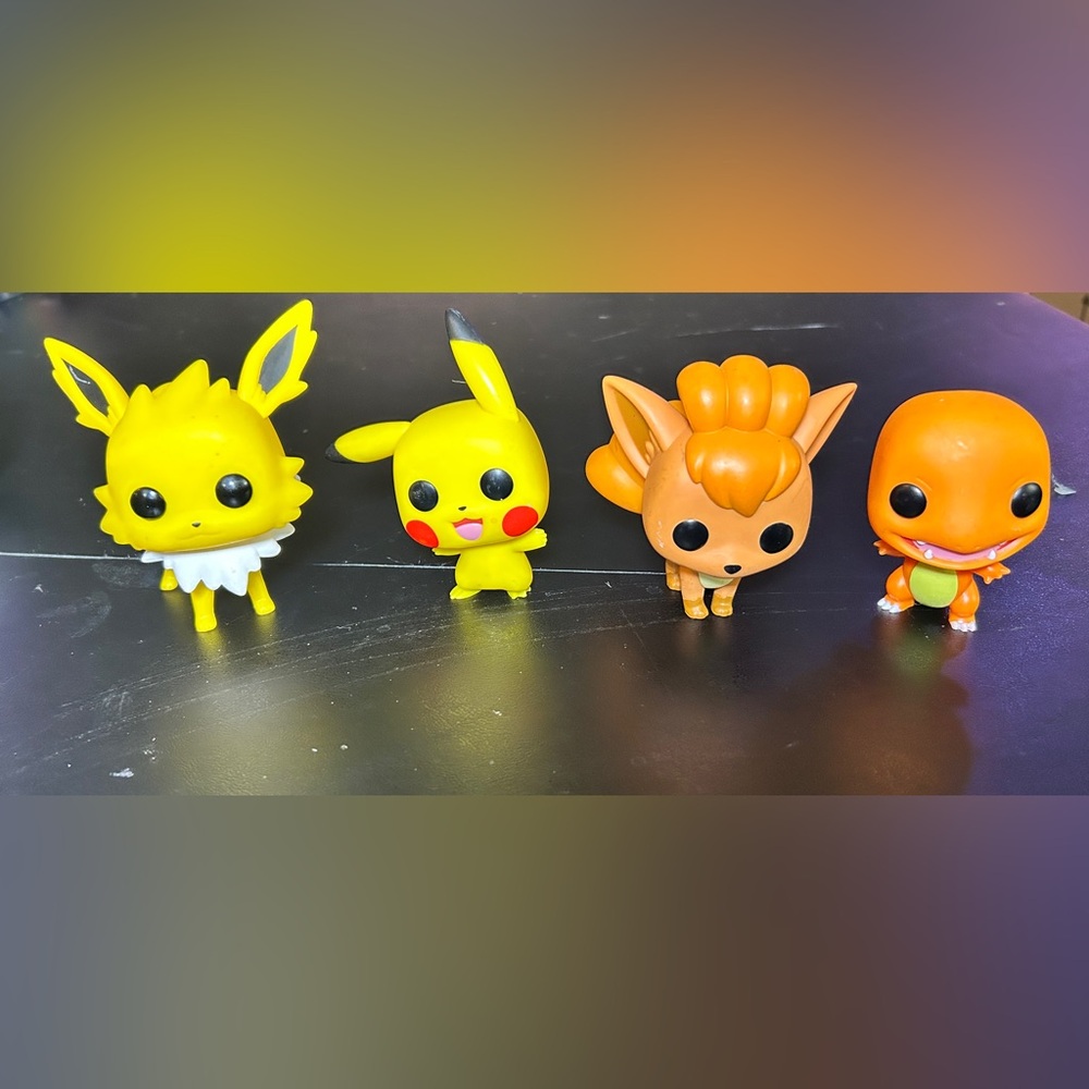 Funko Pop! vinyl figures Pokémon Jolteon, Pikachu, Vulpix, and Charmander